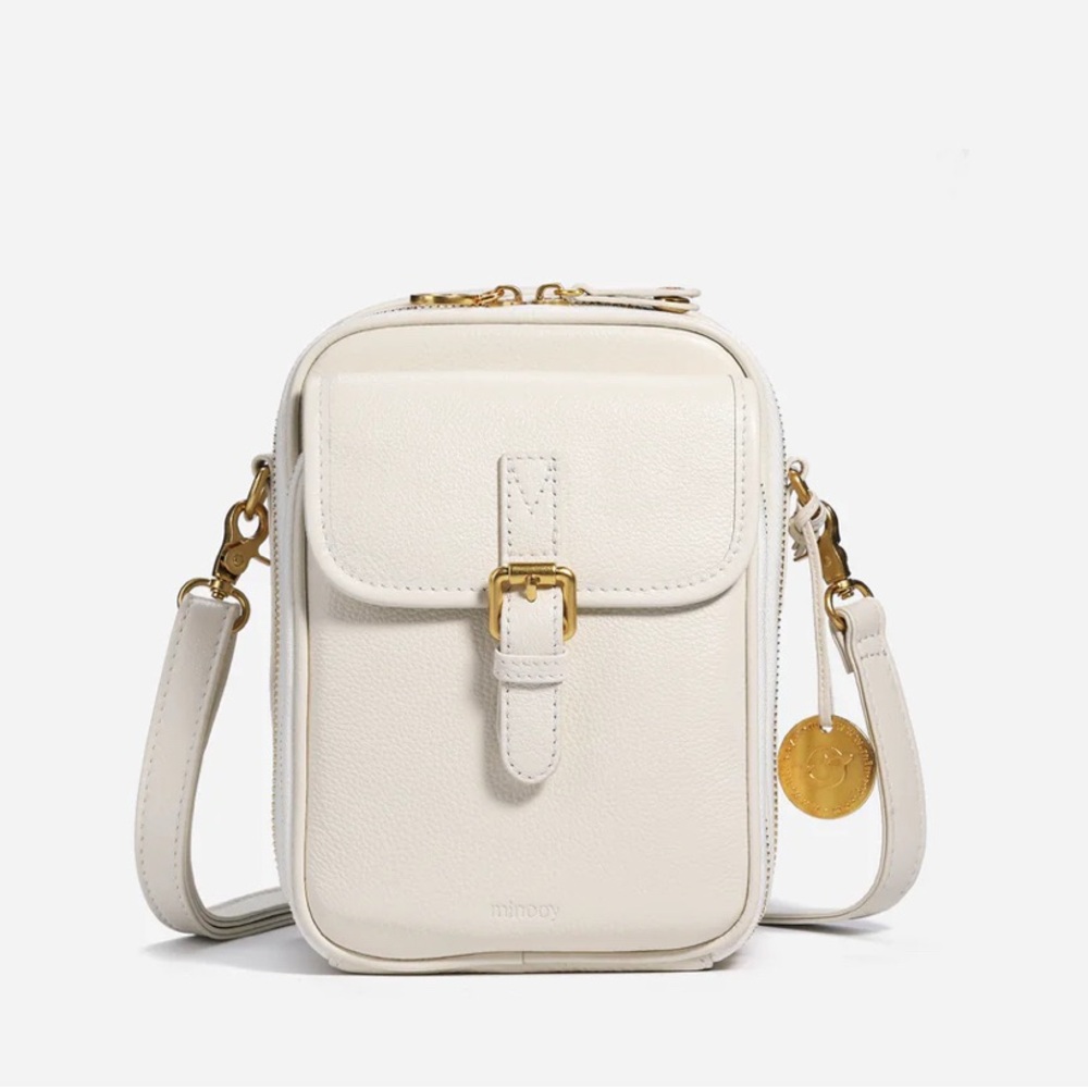 Like new, pristine, used once, Minooy crossbody bag with RFID protection.